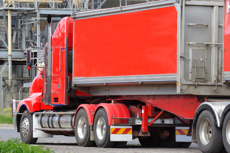 Red articulated semi truckの写真素材