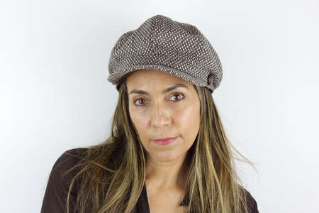 Beautiful Colombian Woman wearing a summer hatの写真素材