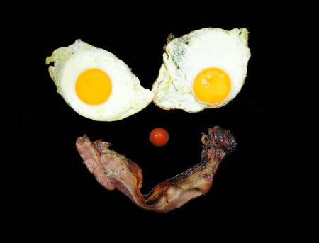 A face made from eggs and baconの写真素材