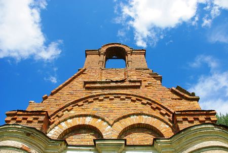 Ruins of old Christian brick church in a remote place.の写真素材