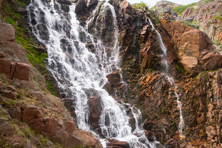 waterfalls behind a polar circle in the summerの写真素材