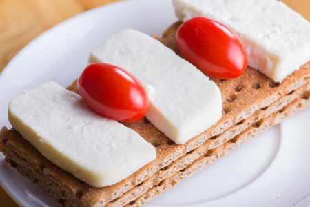 a sandwich on a plate for breakfastの写真素材