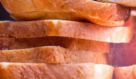 Slices of white bread closeup of baking