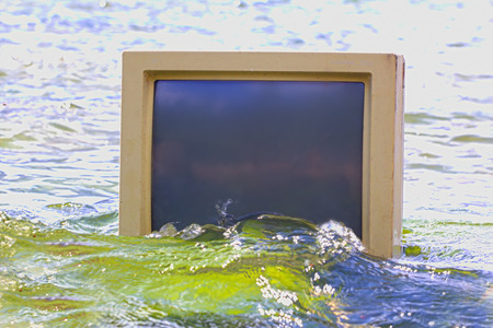 unusual frame sea surrounds computer monitorの写真素材