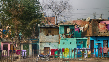 India, Delhi - Dec 28, 2015: Typical home stay of not very rich Indians, mix of villages and towns, Megapolis Delhi (outskirts)のeditorial素材