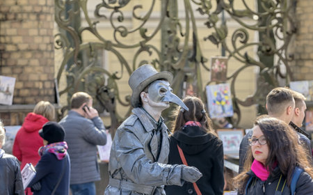Russia, Saint Petersburg - may 1, 2017: Public celebrations and carnival masks. Man in image of devil or Cyrano de Bergerac. Mask non punishment as way of manifestation of bad side of human natureのeditorial素材