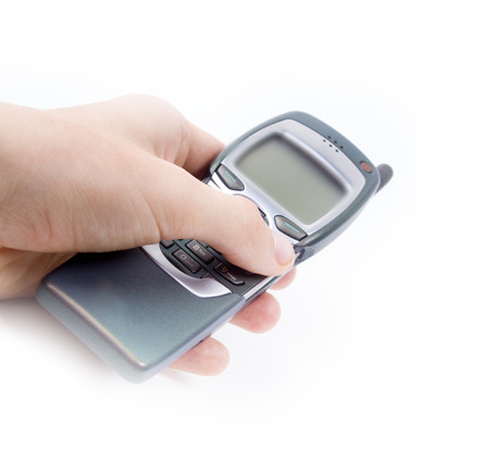 Old Mobile Phone. disposed obsolete phone on white background