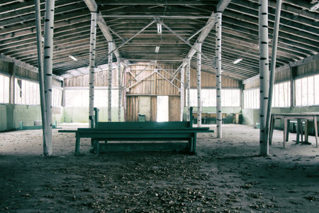 interiors of decaying industrial spaces for survival games. terrible abandoned camp in woodsの写真素材
