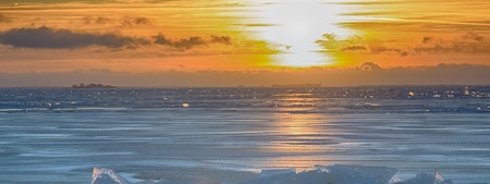 Baltic sea in winter. Fresh ice hummocks and cracks in ice edge