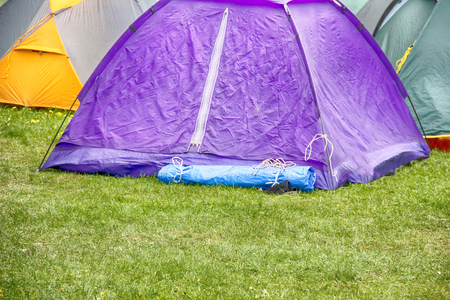 camping outdoor with tent in woods in summerの写真素材