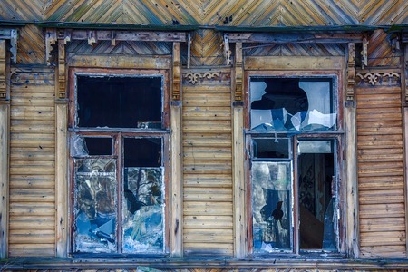 glass breakage, danger. big window with blue glass destructionの写真素材