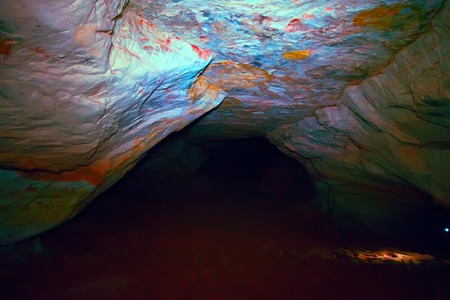 Old mine for extraction of sand and stone examined cave touristsの写真素材