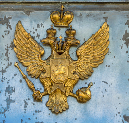Russia, St. Petersburg - June 7, 2017: Architectural extravagances, aesthetic frills, decoration of buildings and streets. Sculpture, reliefs, symbols, chimeras, arabesque, emblem, coat of arms. Double-headed Russian Imperial eagle emblemのeditorial素材