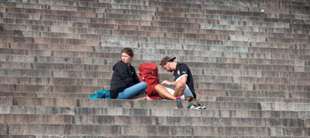 Helsinki , Finland - August 22, 2017: Cathedral Of St. Nicholas, tourists rest on steps of monumental building attractionsのeditorial素材