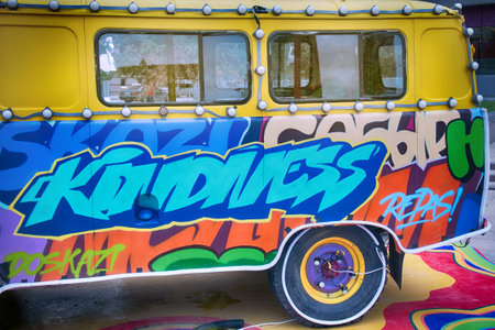 Astana , Kazakhstan - August 10, 2016: Old van decorated with graffiti and lights. Modern kitsch - Youth style, exterior designer, modern decor, unabashed kitsch, contemporary art, pop art, primitiveness, tastelessness. Exterior stylingのeditorial素材
