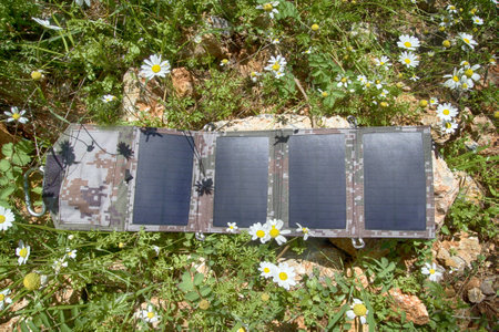 A set of portable solar panels used for camping. environmentally friendly electricity in flowersのeditorial素材