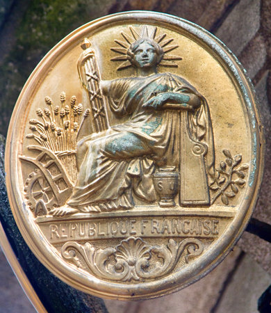 Limoges, France - September 28, 2017: Architectural details on building, aesthetic frills. Allegory of French Republic - women freedom, seal of Second Republic, Laurel crown with seven rays of libertyのeditorial素材