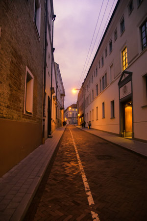 Lithuania, Vilnius - September 5, 2017: Capital of Lithuania. Night views of old city and narrow streets of medieval fortressのeditorial素材