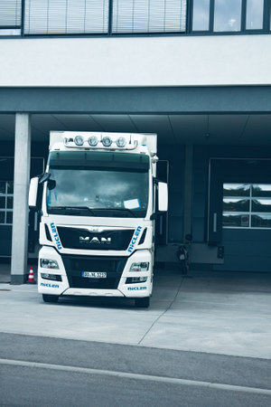 Stuttgart , Germany - 12 September 2017: Heavy-duty car, trailer under unloading