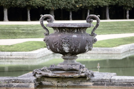 Versailles, France - September 26, 2017: Palace of Versailles, fountains and ponds. Cornucopia, horn of plenty, vase, cup, goblet of waterのeditorial素材
