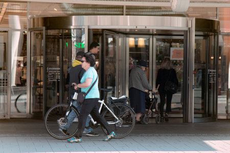 HELSINKI, FINLAND - AUGUST 24, 2017: Large corporations in different countries. Stockmann - fashion collections of clothes and footwear, extensive franchise. At entrance to shopping centerのeditorial素材