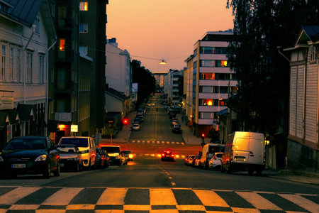 Helsinki, Finland - August 24, 2017: City on border of day and night, sunset and street lighting. Evening cityのeditorial素材