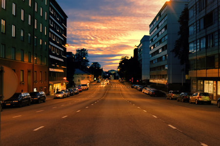 Helsinki, Finland - August 24, 2017: City on border of day and night, sunset and street lighting. Evening cityのeditorial素材