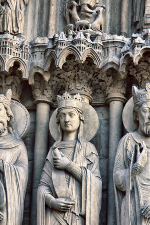 Notre Dame de Paris Cathedral Gothic style. Architectural details. portal of St. Anneのeditorial素材