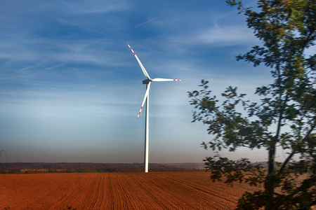 Wind turbines among open space of Europe. Alternative energy sources in European Union. Wind...