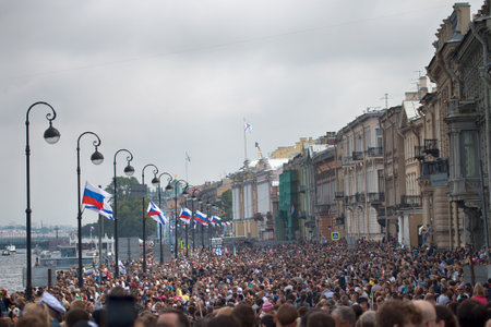 Saint Petersburg, Russia - July 30, 2017: Summer festival Navy. People walk along embankment of river Nevaのeditorial素材