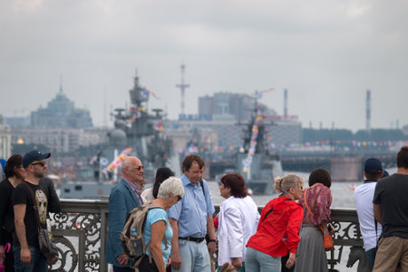 Saint Petersburg, Russia - July 30, 2017: Summer festival Navy. People walk along embankment of river Nevaのeditorial素材