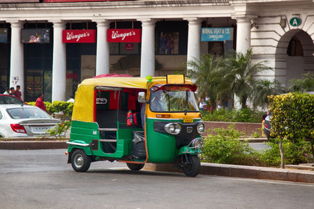 India, new Delhi-March 1, 2018: rickshaw taxis in streets of capital. main type of taxi in Indiaのeditorial素材