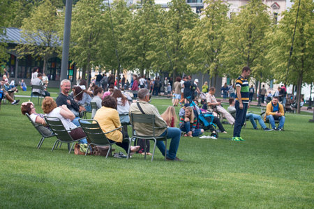 Saint Petersburg, Russia - July 30, 2017: yoga festival on lawn in Park in center of metropolis. Summer holiday of sport and healthのeditorial素材