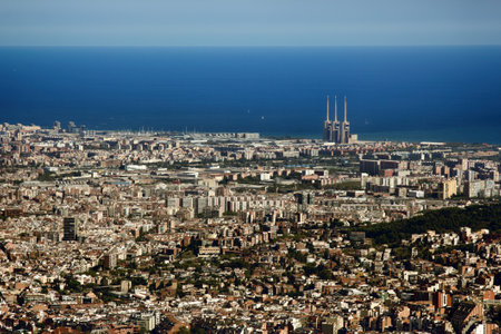 Seaside town. Top view from mountain to city by Mediterranean sea.