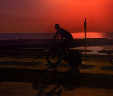 Cycling Club, cycle tourism. Bicycle touring as way of young people life. Bikes on beach...