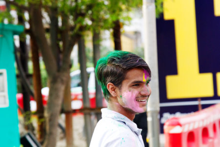 India, new Delhi - March 1, 2018: happy people during Holi celebration in India. Holi Hindu spring festival celebrated on the full-moon day of Phalguna with many characteristics of a Saturnaliaのeditorial素材