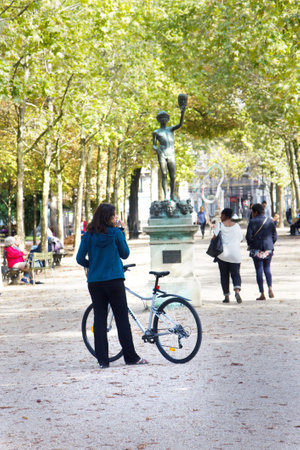 Paris, France - September 23, 2017: girl with a bike in the Park in Paris.のeditorial素材
