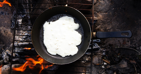 festival week before Lent. festival is held outdoors, pancakes are baked on fireの写真素材