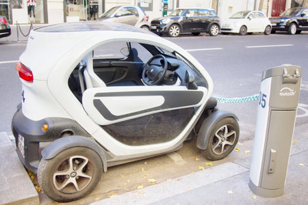 France, Paris - 24 September 2017: owner recharges batteries of your electric car at charging...