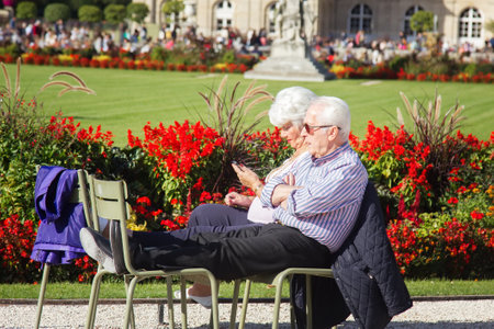 Paris, France - September 23, 2017: walk and rest of elderly people in the Luxembourg gardenのeditorial素材