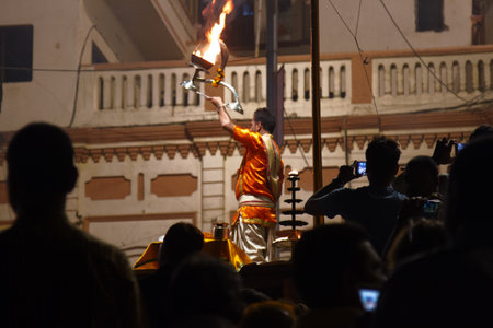 India, Varanasi - March 20, 2018: Fire Puja is not only a religious ceremony, but also one of main attractions for tourists.のeditorial素材