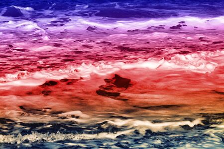 Bright coastal color wave with splashes. Joy to visit the sea on vacationの写真素材