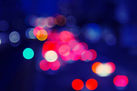 Red and blue holiday bokeh. Abstract Christmas backgroundの写真素材