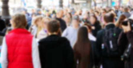 strong blurred, crowds of anonymous people on a city holiday in metropolisの写真素材