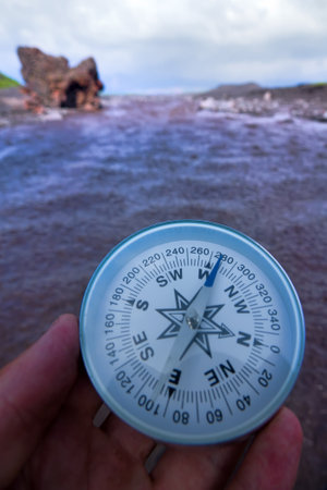The right compass is always needed for travelers, adequate course. Hiking on the shore of Lake...