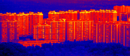 bedroom suburb Imperfect in the characteristics of thermal insulation, high-rise buildings emit a lot of thermal energy. Power economy, heat economy. Illustration of thermal imagerの写真素材