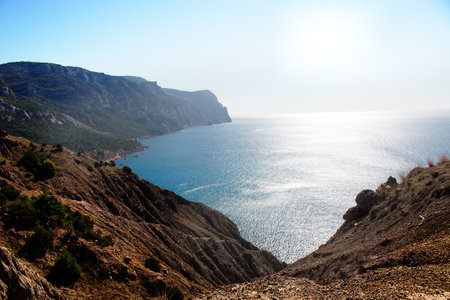 Seascape. View of the coast and the Black Sea in the sunlight. Crimea, Crimean mountainsの写真素材
