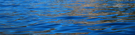 Slightly undulating surface of the sea. Panorama. Sea color, ultramarine blue