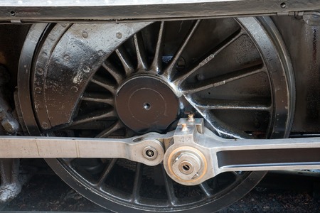 Old steam train locomotive weel close up.の写真素材