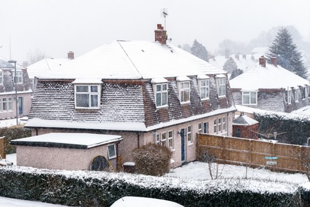 Snowfall in Devon, Crediton, England. Council house in snow March 1 2018のeditorial素材